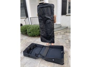 Tumi 4- Wheeled Black Extended Travel Luggage W Removable Garment Bag