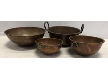 Four Heavy Copper Bowls