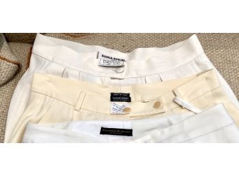 Three Pairs Of White Wide Leg Trousers From Giorgio Armani, Donna Karan And Sonia Rykiel