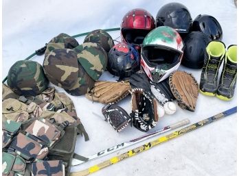 Helmets And Camo Bag