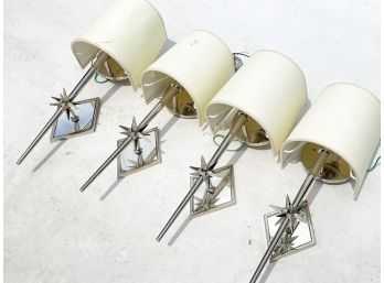 A Set Of 4 Modern Mirror And Chrome Star Form Sconces