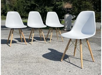 A Set Of 4 Modern Acrylic Bucket Chairs By Nuevo Furniture