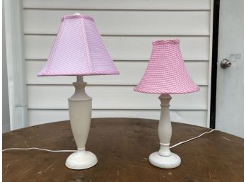 A Pair Of Metal Lamps