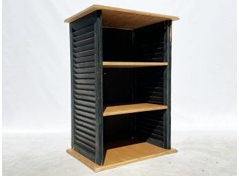 A Bookshelf With Rustic Shutters On Sides - Cool Reclaimed Look!