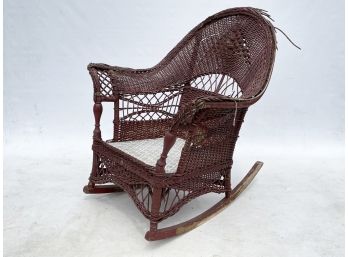 A Vintage Wicker Rocking Chair (AS IS)