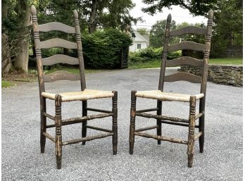 A Pair Of Vintage Rush Seated Ladder Back Chairs