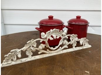 Enameled Metal Pots And A Cast Iron Accent Decor