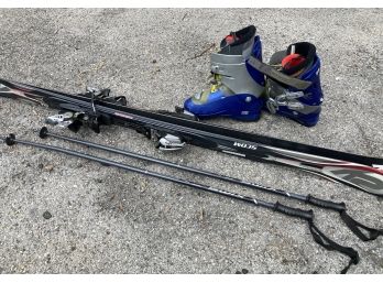 A Set Of Comanche Scom Skis, Poles, And Size 11/5 Boots