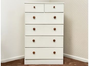 A White Painted Wood Chest Of Drawers