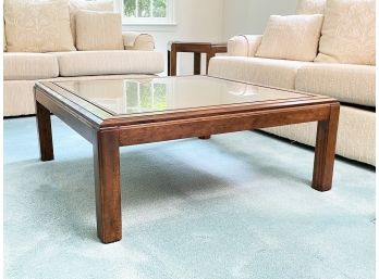 A Vintage Glass Top Coffee Table