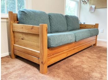 A Vintage Wood Framed Sleeper Sofa