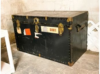 A Vintage Metal Travel Trunk