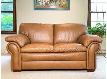 A Leather Loveseat By Ethan Allen