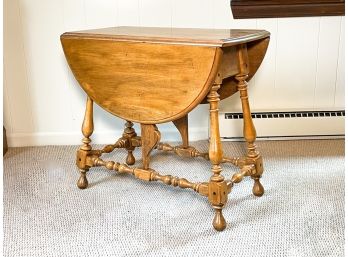 A Hard Wood Drop Leaf Side By Ethan Allen