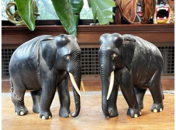 A Pair Of Antique Carved Ebony Elephant Figurines