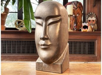 A Cast Face In Bronze Tone