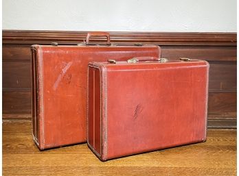 A Pair Of Vintage Samsonite Leather Nesting Suitcases