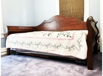 An Empire Style Day Bed With Trundle