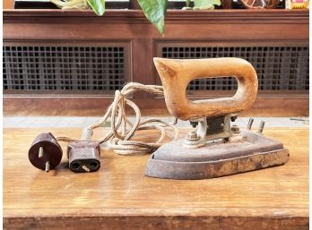 An Antique Wood Handled Electric Iron