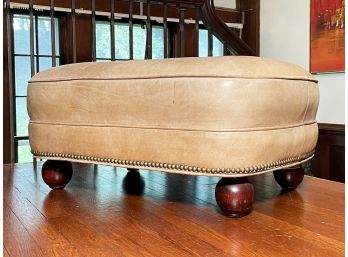 A Vintage Leather Ottoman