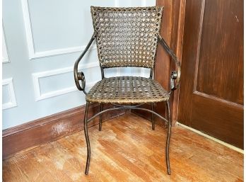 A Vintage Cane And Metal Arm Chair