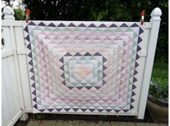 Attractive Quilted Diamond Or Sawtooth Pattern Quilt In Pastels.