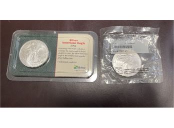 2 Pc American Eagle Uncirculated Silver Dollars 2003.  , 2008  . 999.