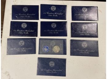 10 Eisenhower Proof Silver Dollars 40 Pecent Silver. In Sealed Blue Envelopes. Excellent Condition.