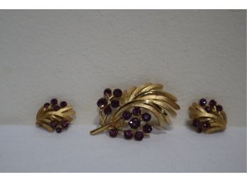 Trifari Gold Tone With Purple Rhinestones Pin And Clip On Earrings