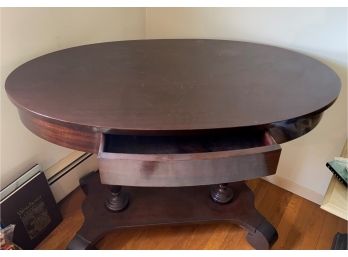 An Antique American  Empire Oval Library Table With One Drawer