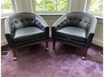 A PAIR OF MID-CENTURY MODERN BLACK LEATHER ARMCHAIRS BY HIGHLAND FURNITURE