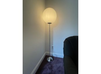 A MID-CENTURY MODERN 58' TALL CHROME FLOOR LAMP WITH SPHERICAL SHADE