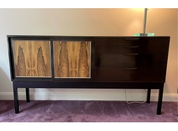 A HARVEY PROBBER SIDEBOARD WITH CONTRASTING WOOD PANEL DOORS AND BLACK LACQUER FINISH