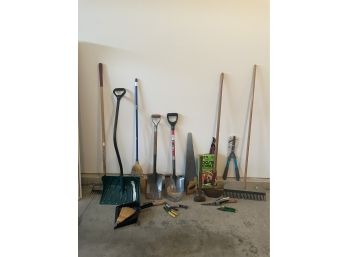 OUTDOOR TOOL LOT INCLUDES SHOVELS, SPADE, METAL RAKE ETC.