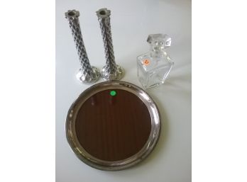 A SILVERPLATED TIP TRAY, A PAIR OF PEWTER ORGANIC FORM CANDLESTICKS, AND A OREFORS GLASS DECANTER