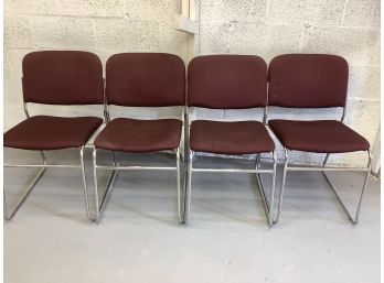 Four Burgandy Office Chairs