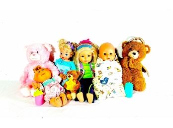 Group Of Baby Dolls And Teddy Bears