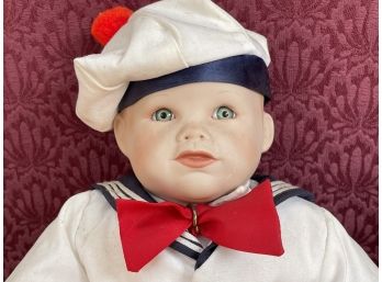 Cute Porcelain Doll Dressed In A Navy Uniform. Markings On The Back Of The Neck.