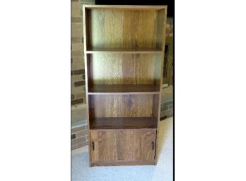 4 Shelf Bookcase With Sliding Compartment Lower Shelf.