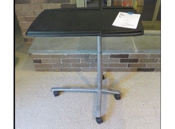 Adjustable Height Bedside Computer Table On Wheels Or Doubles As Hospital Bed Table