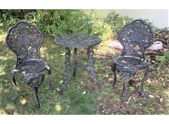 Cast Iron Bistro Table And Two Chairs.