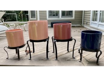 Group Of Outdoor Planters With Iron Stands