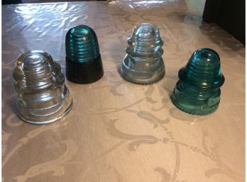 4 Vintage Clear And Colored Glass Insulators