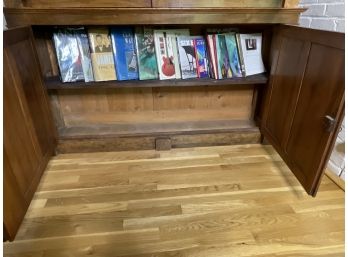 A Shelf Of Hardcovered Coffee Table Books