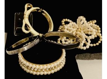 Pearls And Hinged Cuffs