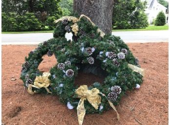 Four Faux Christmas Wreaths With Gold Bows