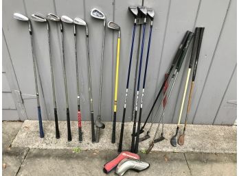 Collection Of Golf Clubs Including PING And Titleist