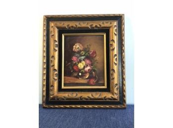 Black And Wooden Framed Painting Of A Vase Of Flowers