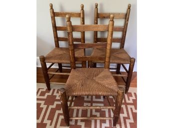 Three Rush Seat Ladder Back Chairs