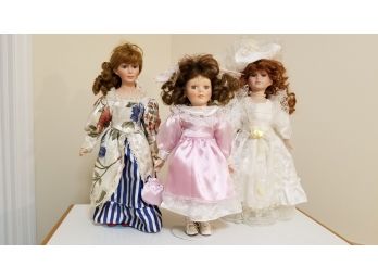 Three Collectible Dolls